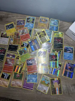 Pokemon TCG Mixed Card Lot Holo & Regular Pikachu Reshiram Voltorb - Image 1