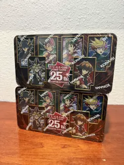 (2) YuGiOh DUELING HEROES 25TH ANNIVERSARY TIN FACTORY SEALED - Image 1