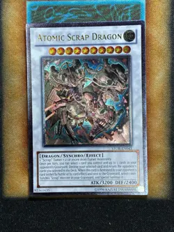 Yugioh Atomic Scrap Dragon STOR-EN043 Ultimate Rare NM - Image 1