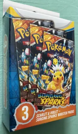 POKEMON TCG SCARLET & VIOLET SURGING SPARKS BOOSTER BUNDLE with 3 Booster Packs - Image 1
