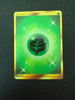 Pokemon - Grass Energy (Secret) 167/145 Sm-Guardians Rising Holo - NM - Image 1