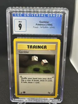 1999 Pokemon Fossil 1st Edition Gambler 60/62 CGC 9 Mint - Image 1