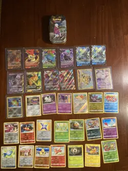 Pokemon Card Lot Of 33 Cards All Uncommon And Rares plus a Pokemon tin. - Image 1