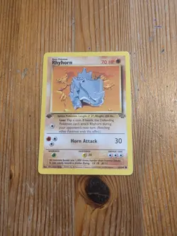 1st First Edition Rhyhorn 61/64 Jungle Pokemon F3 1999 WoTC TCG Vintage LP - Image 1
