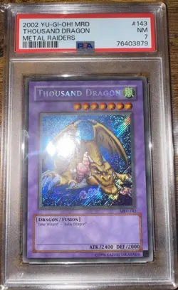 2002 Yu-Gi-Oh! MRD-Metal Raiders #143 Thousand Dragon PSA 7 NEAR MINT - Image 1