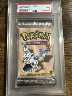 1999 Pokemon Fossil 1st Edition – PSA 9 Booster Pack Sealed – Aerodactyl - Image 1