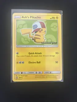 Ash’s Pikachu SM112 Ultra Rare Non Holo Exclusive Promo Pokemon Card - Image 1