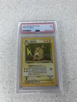 RAICHU HOLO 14/62 FOSSIL POKEMON PSA 1 - Image 1