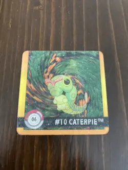 1999 Artbox Pokemon Action Flipz - Premier Edition Caterpie Metapod #10 - Image 1