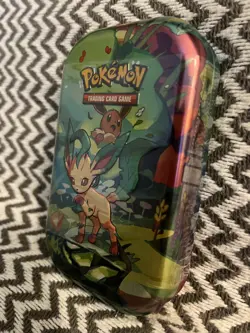 Pokemon TCG: Scarlet & Violet-Prismatic Evolutions Mini Tin | Leafeon I In Hand - Image 3