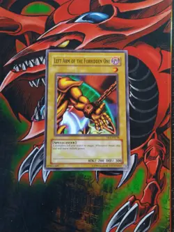 Left Arm of the Forbidden One - DB1-EN138 - Common - Unlimited Edition Yugioh LP - Image 1
