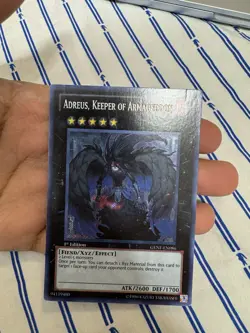 Yugioh Adreus, Keeper Of Armageddon GENF-EN086 Secret Rare 1st Ed HP See flaws - Image 1