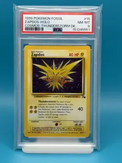 PSA 8 - 1999 POKEMON FOSSIL ZAPDOS-HOLO COSMOS THUNDERSTORM DECK - Image 1
