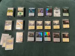 Lot of sealed MTG land packs from various sets. - Image 1