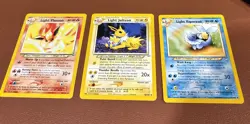 Pokemon WOTC Eeveeloution Neo Destiny Light Jolteon Vaporeon Flareon LP/NM - Image 1