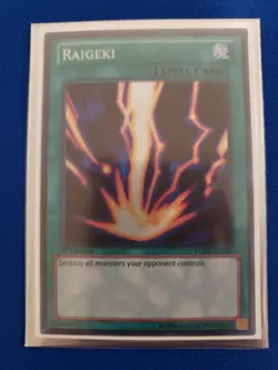 Yugioh Raigeki LCJW-EN057 1st Edition Secret Rare LP - Image 1
