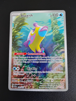 NM Bruxish 200/191 Sv08: Surging Sparks Foil IR Pokemon Card - Image 2