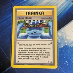 Focus Band Trainer Reg. 86/111 Neo Genesis Unlimited Pokemon LP - Image 1