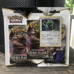 Pokemon Sword & Shield Rebel Clash Rayquaza Promo Card & Coin Blister Pack - Image 1
