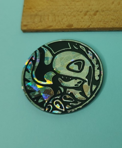 Single Mega Absol Pokemon TCG Coin Cracked Ice - Image 1