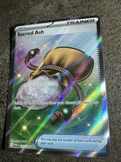 Sacred Ash 115/088 Pokemon TCG Prismatic Evolutions Gold Trainer Card - Image 1