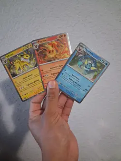 Pokemon TCG: Prismatic Evolutions Poster Collection Cosmos Holo Promos Set of 3 - Image 1