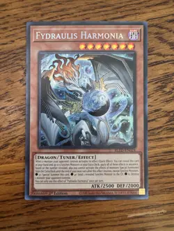 Yugioh - Fydraulis Harmonia - Secret Rare - BLZD-EN024 - 1st Edition Mint Nice - Image 1