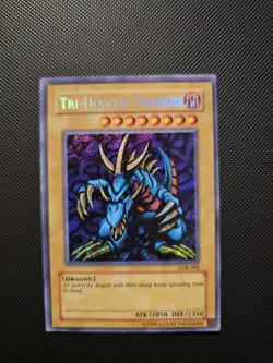 Tri-Horned Dragon LOB-000 Legend of Blue Eyes White Dragon Unlimited NM - Image 1