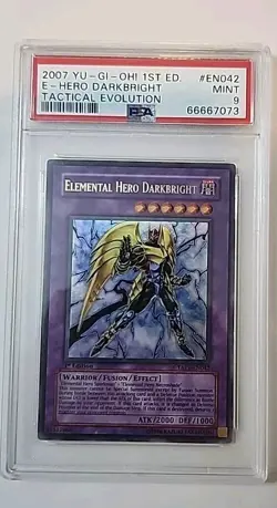 YuGiOh Elemental Hero Darkbright TAEV-EN042 Tactical Evolution 1st Edition PSA 9 - Image 1
