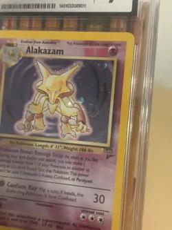 1999 Alakazam Pokemon Base Set 2 1/130 Unlimited Holo Rare CGC 7 * SWIRL - Image 2