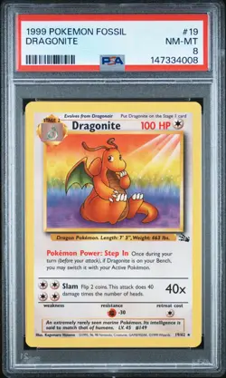 1999 POKEMON FOSSIL #19 DRAGONITE PSA 8 - Image 1