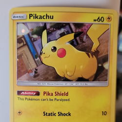 Pokemon TCG Pikachu SM157 Black Star Promo Holographic Card NM/LP - Image 1