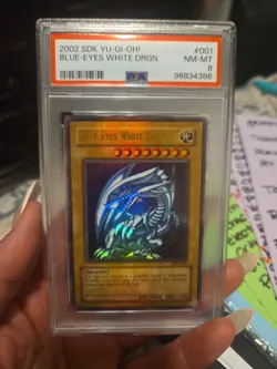Vintage 2002 Yugioh Blue-Eyes White Dragon SDK-001 PSA 8 - Image 1