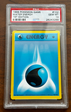 1999 POKEMON GAME #102 WATER ENERGY 1ST EDITION PSA 10 - Image 1