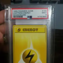 1999 POKEMON GAME BASE SHADOWLESS #100 LIGHTNING ENERGY PSA MINT 9 - Image 1