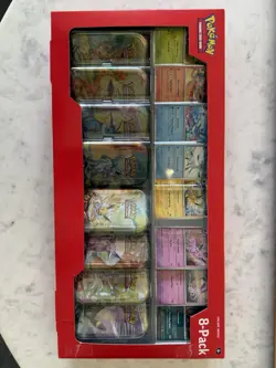 Pokemon Prismatic Evolutions - Costco Exclusive - Tin Box 8-Pack Booster Promo - Image 1