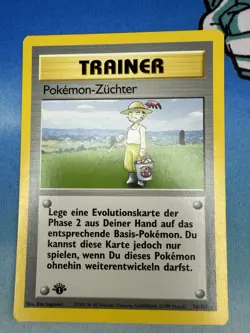 Pokemon-Zuchter Breeder 76/102 Base Set 1st Edition German Pokemon Card - Image 1