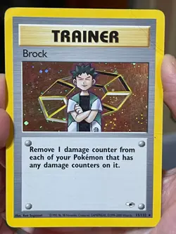 POKEMON BROCK 15/132 RARE COSMOS HOLO WITH SWIRL GYM HEROES HP/DM SEE PICS - Image 1