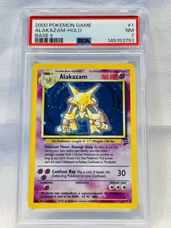 2000 Pokemon Base Set 2 ALAKAZAM Holo #1 PSA 7 NM WOTC SWIRL 💫 - Image 1