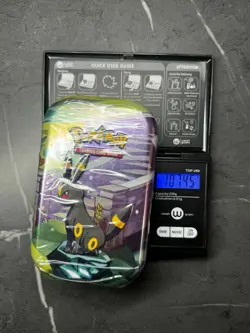 (VERY HEAVY)🔥 107.45g Pokemon Prismatic Evolutions Mini Tin Brand New Sealed - Image 1