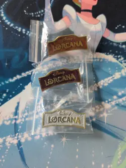 Disney Lorcana Amber, Ruby & Steel League Kit Logo Pins - Image 1