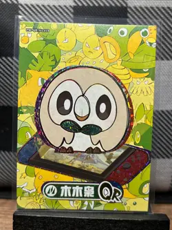 Pokemon TCG: Rowlet PM-QR NO.019, EIF Baby _ HOLO - Image 1