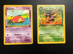 Slowpoke & Dark Gloom Team Rocket 1st Edition Pokemon Card LP/NM Condition - Image 1