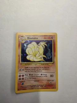 vintage 1999 Pokemon Base Set Ninetales holographic card, numbered 12/102 - Image 1