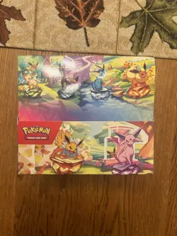 Pokemon TCG: Scarlet & Violet Prismatic Evolutions Mini Tin Display Box (8 Tins) - Image 1