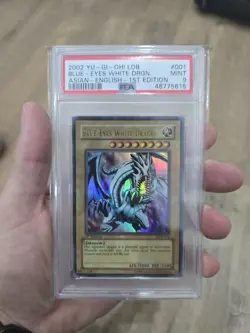 Yu-Gi-Oh Blue Eyes White Dragon 1st Edition LOB-001 Ultra Rare PSA 9- NM-MT AE - Image 1