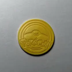 Pokemon Yellow & Silver Reflective Pikachu TCG Coin - Image 2