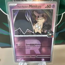 The Pokemon Company Team Rocket's Mimikyu 092/217 ASC Regular Basic HP60 - Image 1