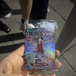 Bandai Namco Monkey.D.Luffy US Voyage Promo Full Art Holo One Piece CCG Card - Image 1