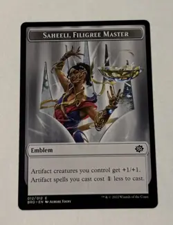 MTG Emblem - Saheeli, Filigree Master - The Brothers' War NM - Image 1